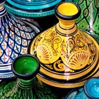 Explore the mythic souks of Fes, the medieval squares and mudbrick arches of Marrakech, the vast, timeless dunes of the Sahara and the citadels beneath the High Atlas peaks