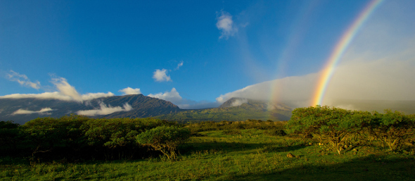 Rainbow over valley Kaupo Gap Hawaii
