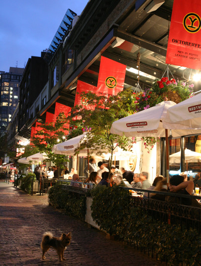 People enjoy patio dining in Yaletown, Vancouver 