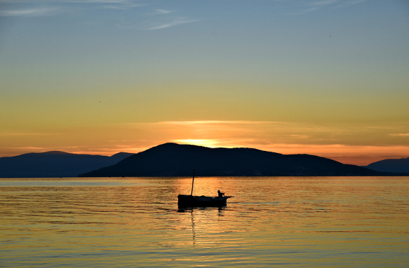 A rich orange sunset over Aegina