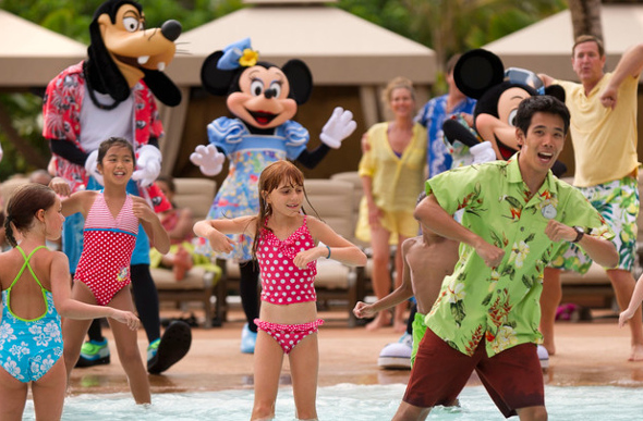 Children dancing with Goofy and Minnie at Aulani, A Disney Resort & Spa