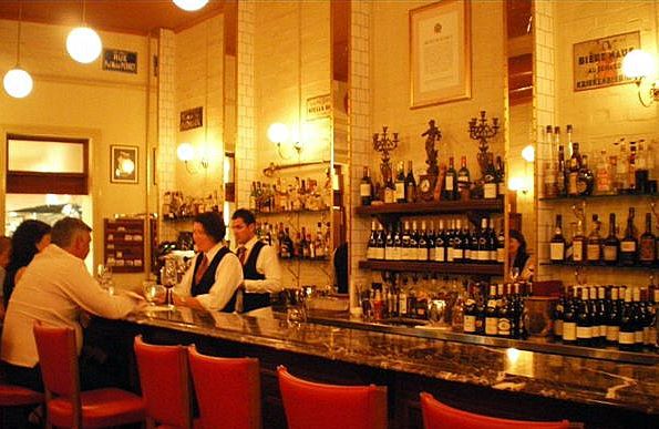  The glowing vintage inspired bar inside Montrachet restaurant. 