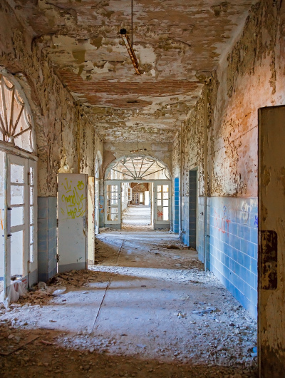 Ruined hallway in abandoned hospital