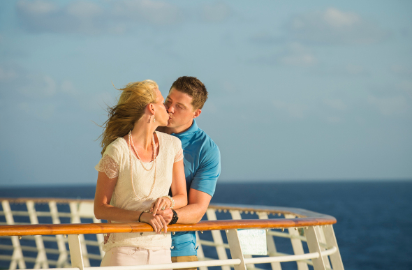 Couple kissing on cruise ship