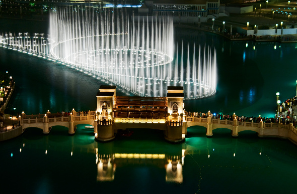 Illuminated jets of water dance at Dubai Fountain.