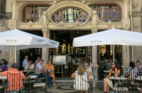People dining at Majestic Cafe in Porto
