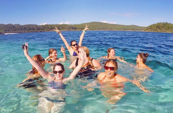Girls swimming in Lake McKenzie