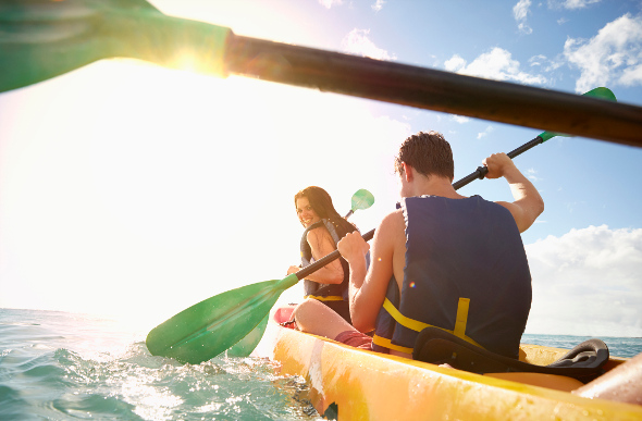 Kayakers explore the waters of Hawaii. Picture: Getty Images