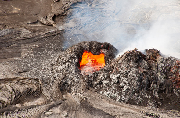 An aerial view into the lava-filled crater of Kilauea in Hawaii.