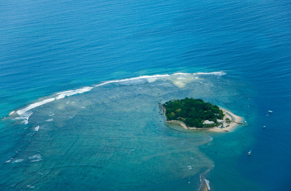 An aerial of Hideaway Island surrounded by open water