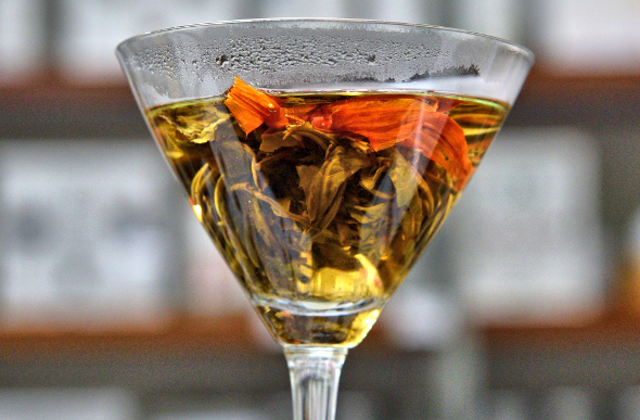 An intricate tea in a cocktail glass