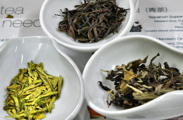 Three bowels of fresh tea leaves in Hong Kong