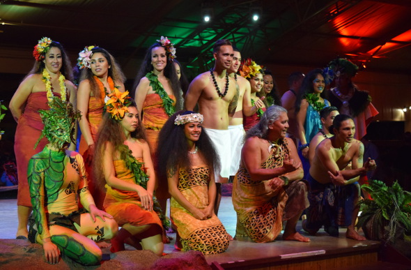  Wearing traditional Hawaiian dress, the cast of Luau Kalamaku take a bow at Kilohana Estate and Plantation on Kauai.