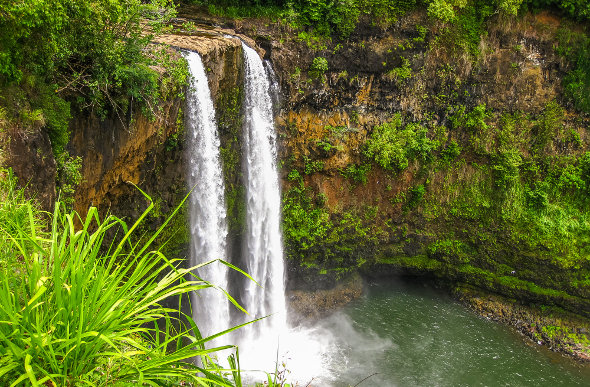 Manawaiopuna Falls is otherwise known as 'Jurassic Park Falls'. Picture: Getty Images