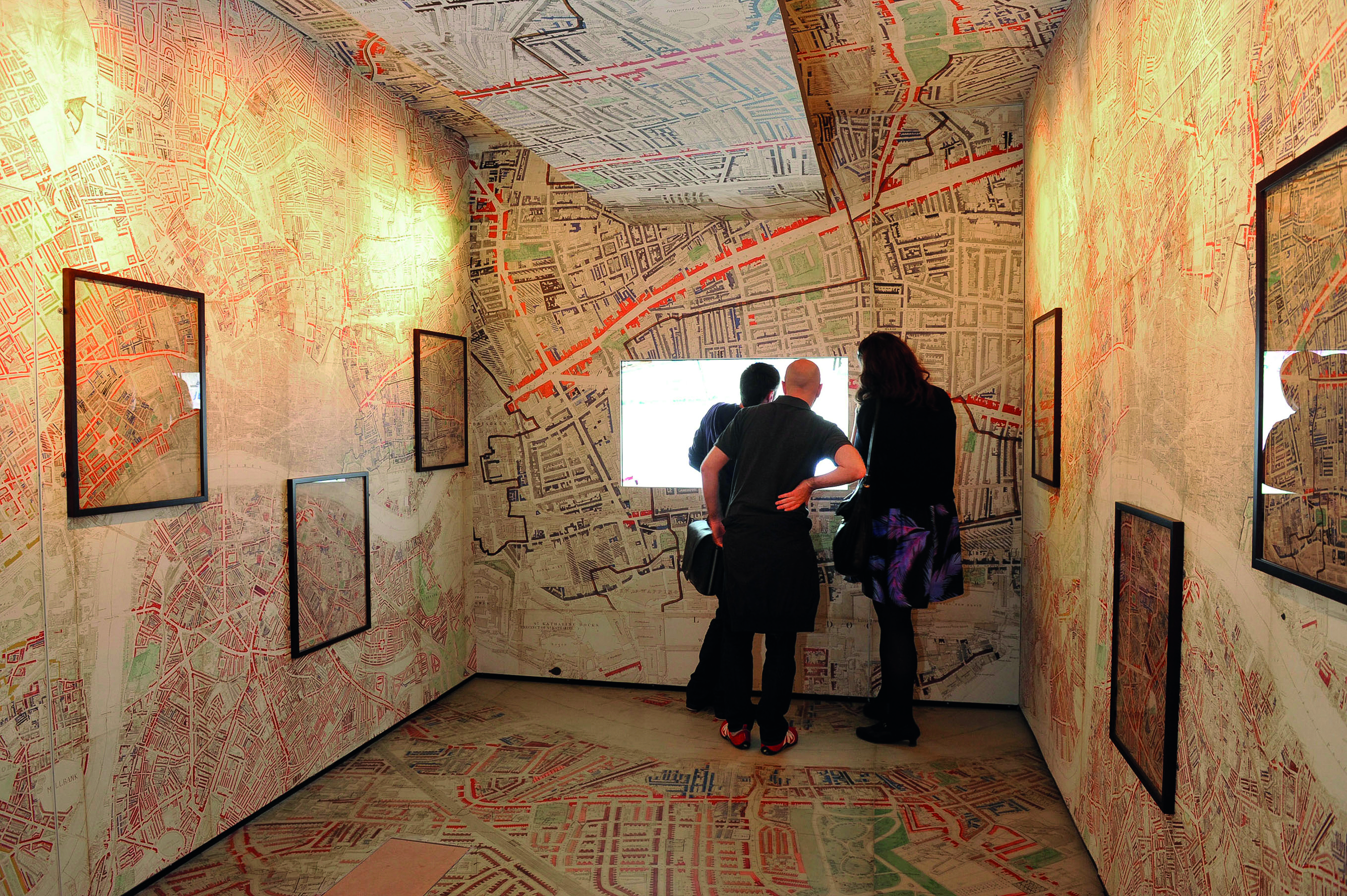 Maps line the walls, ceiling and floors of the Museum of London.