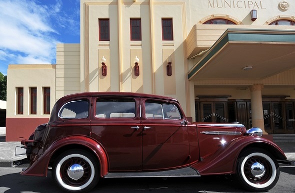 An old 1920s/30s era automobile in front of a Napier building.