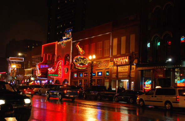 Nashville street with neon-lighted honky tonk bars