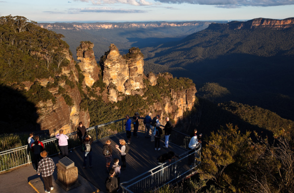 A group of people admiring the Blue Mountains