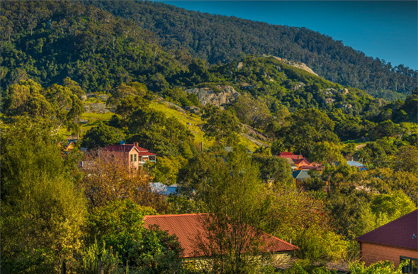 The hamlet of Central Tilba nestles among rolling green hills in New South Wales.