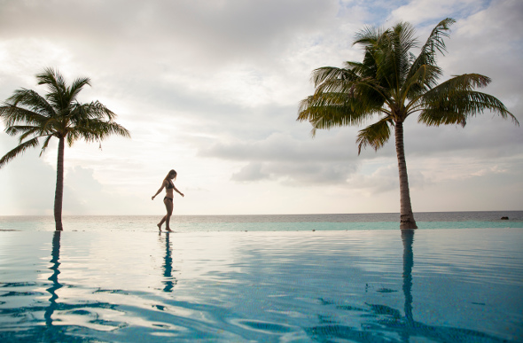 The exterior pools leads to the ocean at Outrigger Konotta Maldives Resort