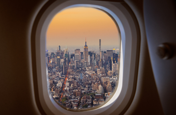A view of Manhattan, New York, through a plane's window.