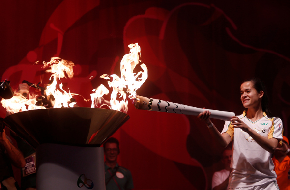 Veronica Hipolito em Sao Jose dos Campos lights the Olympic Flame in Brazil.