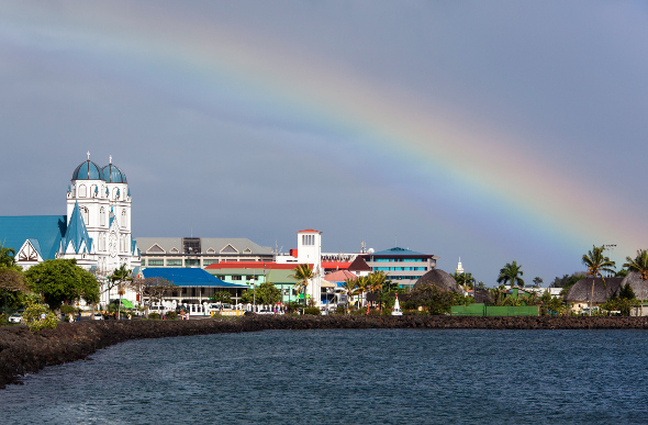 A rainbow above buildings in Apia, Samoa's main centre