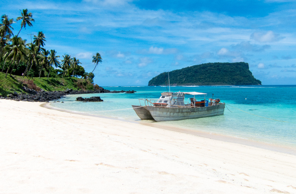 A boat at shore on Lalomanu beach