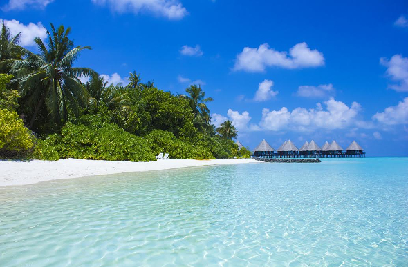 Tahiti bungalows over water.