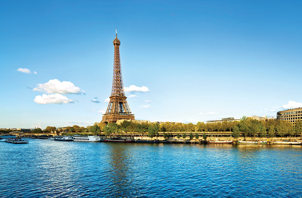 The Eiffel Tower with the Seine river in front