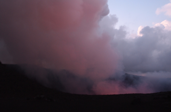 Red smoke rising out of Mt Yasur on Tanna