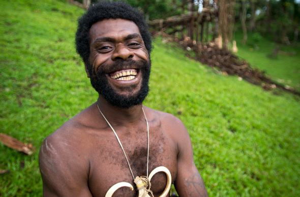 A smiling Ni-Vanuatu man prepares to take part in the land-diving ritual on Pentecost Island in Vanuatu.