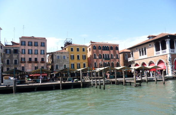 Market stalls on the edge of the canal in Venice