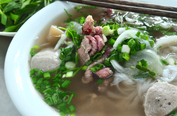 A close-up view of a bowl of pho in Ho Chi Minh City, Vietnam.