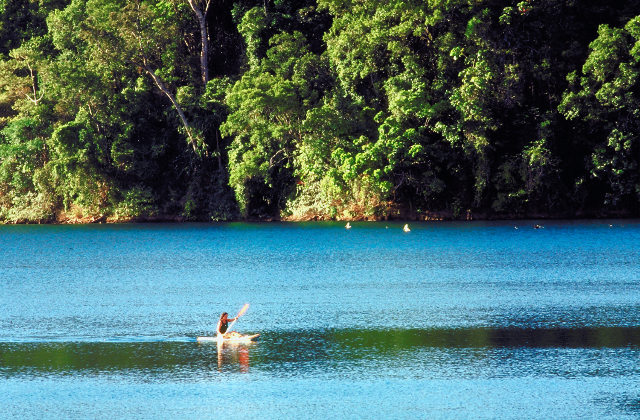 Go for a paddle on Lake Eacham in the Atherton Tablelands.