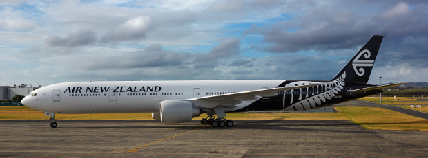 An exterior view of the Air New Zealand Boeing 777 aircraft sitting on the runway