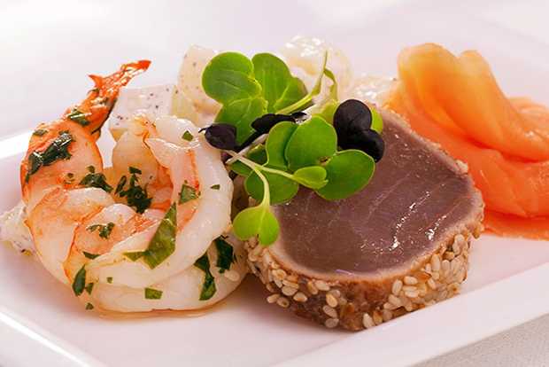 A plate of seafood served in Air New Zealand Business Class