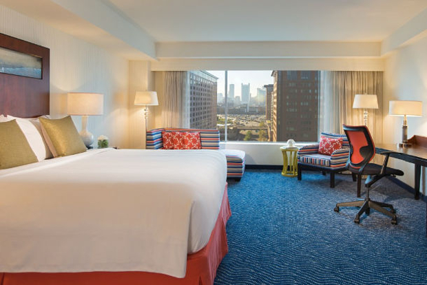 A view of one of the rooms looking out to the Boston city skyline at the Renaissance Boston Waterfront Hotel