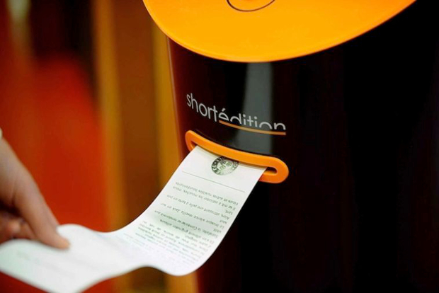 A short edition machine printing out a short story