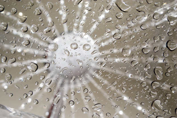 First person point of view looking up at a shower head