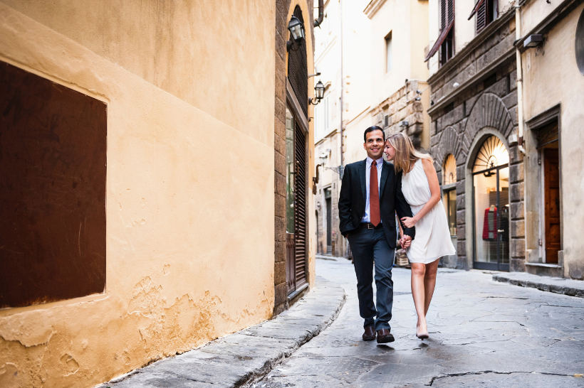 couple dressed up walking in italian street