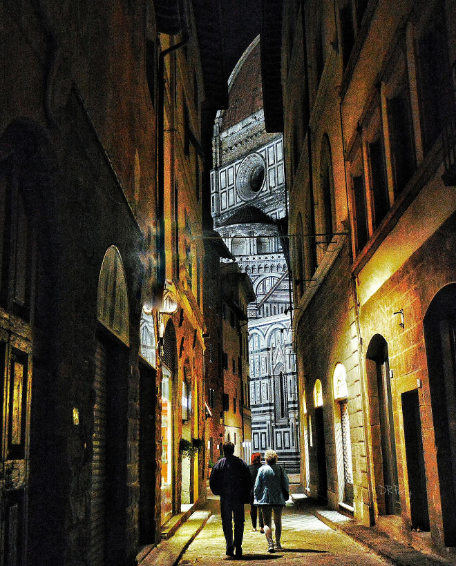 nighttime stroll toward the duomo in florence