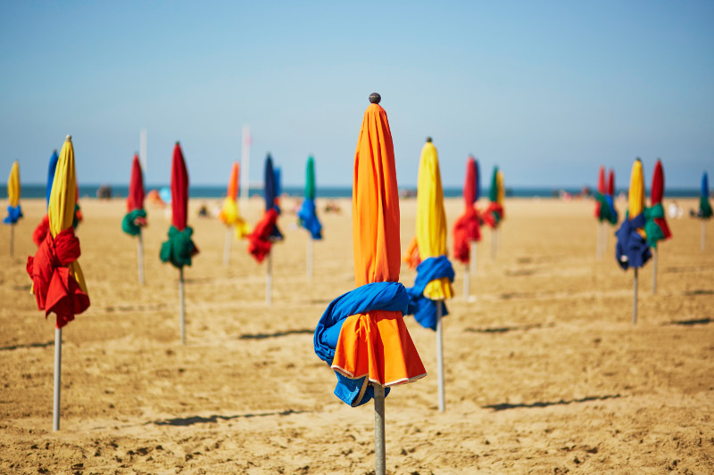 Parasols on the beach at Deauville, France