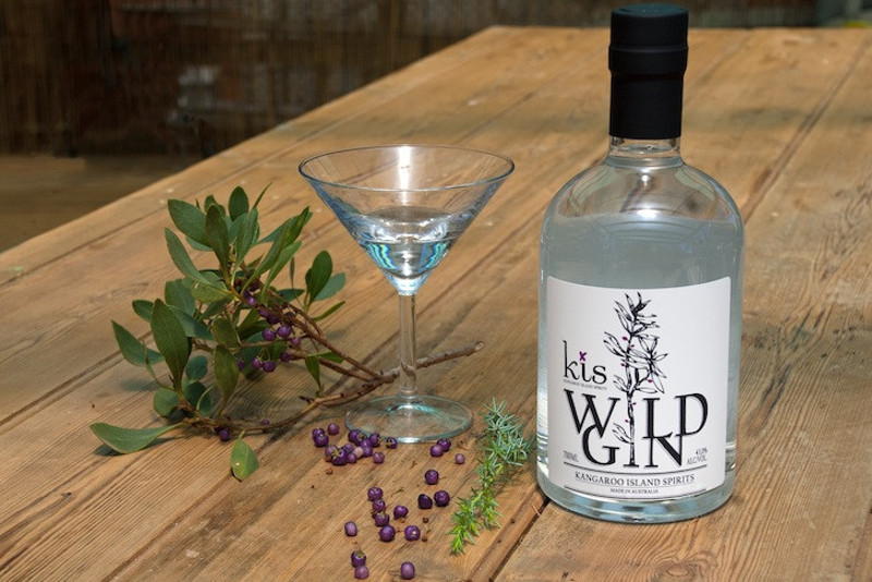 king island spirits gin bottle and glass on table