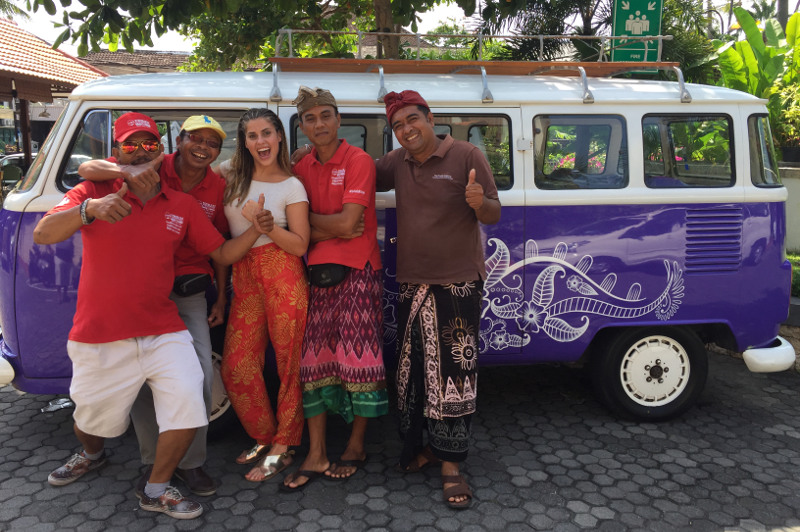 Balinese drivers and tourist in front of Kombi van, Bali, Indonesia