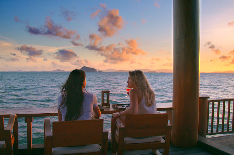 Greer and Rhinannon enjoy sunset drinks