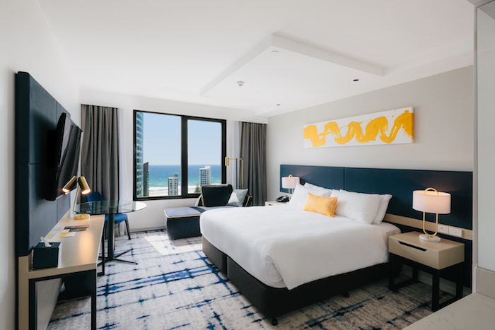 A bright and colourfully decorated room in The Voco, formerley The Watermark Hotel Gold Coast