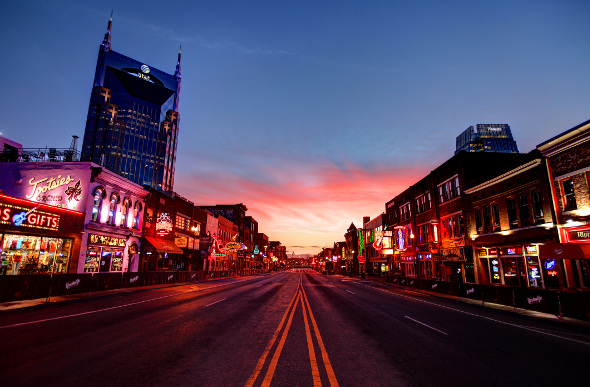 A neon-lit street in downtown Nashville, USA.