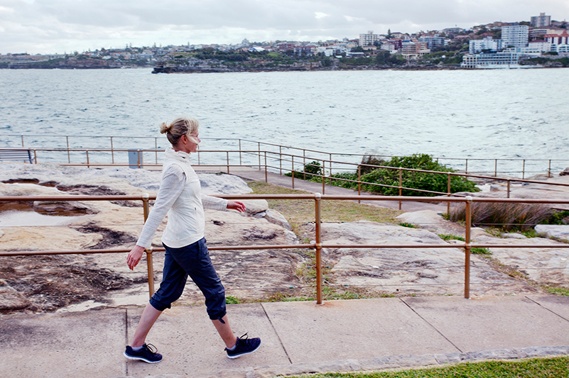 Woman walking Bondi to Coogee Coastal Walk