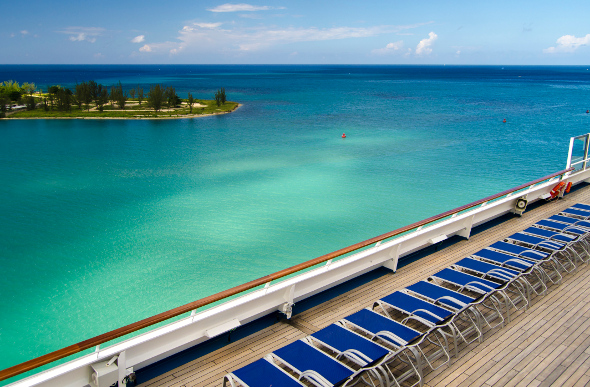 Empty deck chairs on a cruise ship promenade
